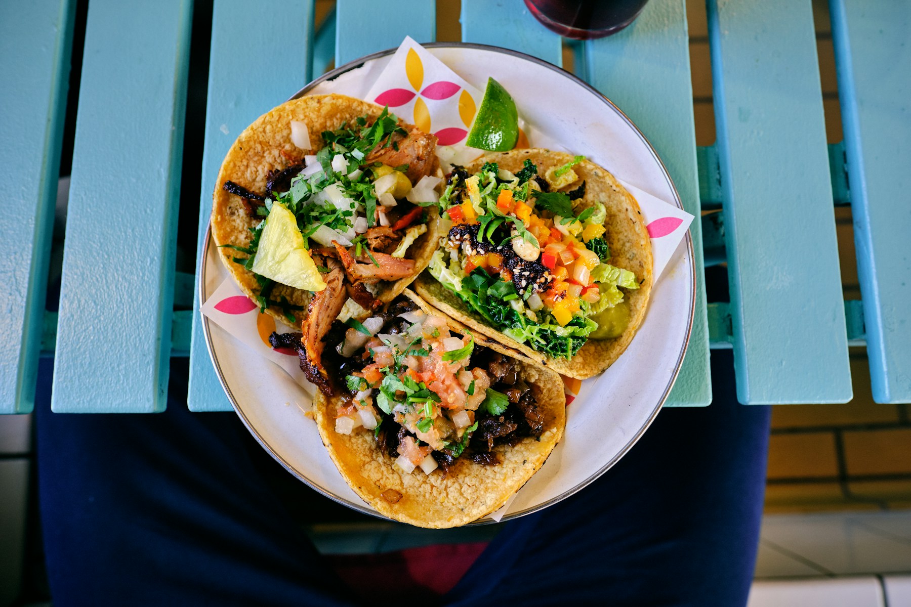 Illustrative photograph of tacos with fresh toppings